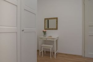 The dressing table with its distinctive Baroque mirror, in Apartment Zlata, an apartment in Zagreb for tourists