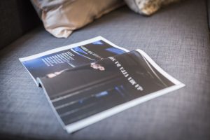 Close-up of a magazine on the couch in Apartment Zlata, an apartment in Zagreb for tourists